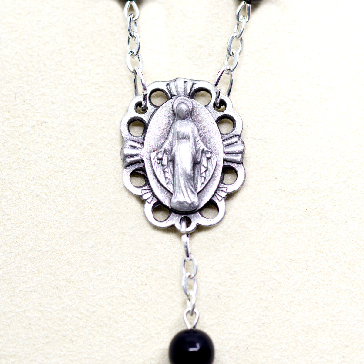 Black rosary with a relic from Jerusalem