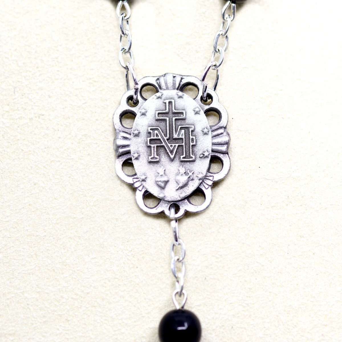Black rosary with a relic from Jerusalem