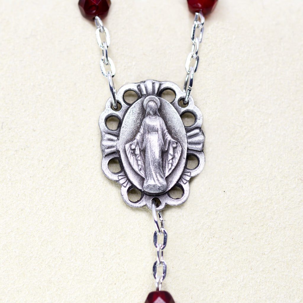 Chapelet rouge avec relique de Jérusalem